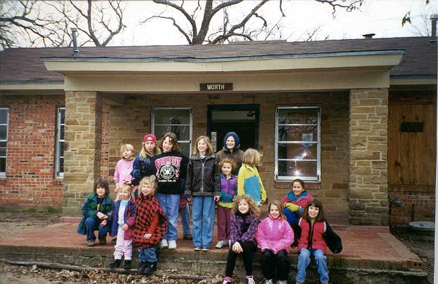 Princesses on Waco cabin porch 2.jpg